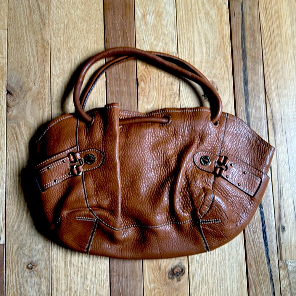 English tan pebble grain leather.